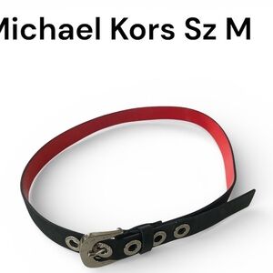NWOT  Michael Kors women’s Black Belt with patent red interior
